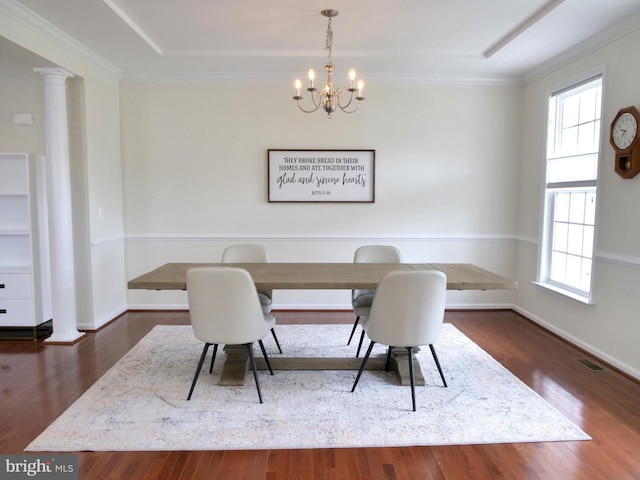 15152 Santander Dr, Gainesville, VA 20155 - dining space with a chandelier, plenty of natural light, wood finished floors, and ornamental molding