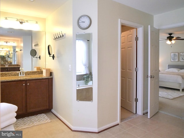 15152 Santander Dr, Gainesville, VA 20155 - bathroom featuring connected bathroom, vanity, ceiling fan, and tile patterned floors