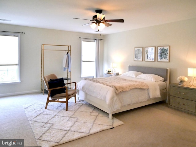 15152 Santander Dr, Gainesville, VA 20155 - bedroom with light carpet, multiple windows, and ceiling fan