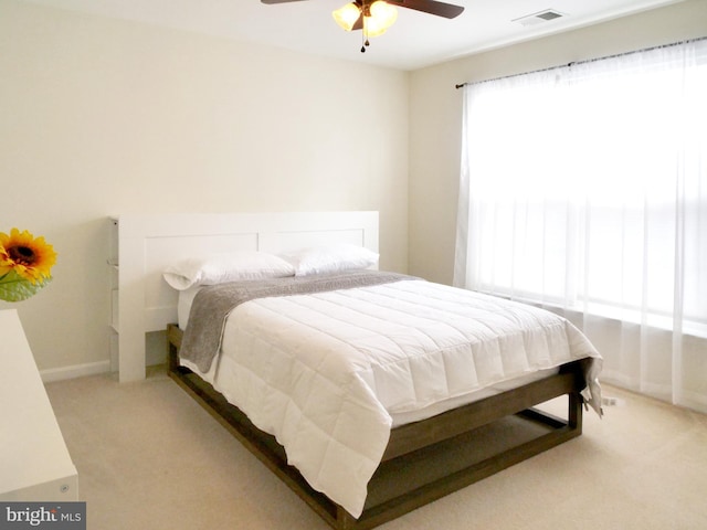 15152 Santander Dr, Gainesville, VA 20155 - bedroom with light colored carpet and ceiling fan