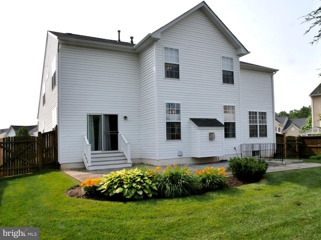 15152 Santander Dr, Gainesville, VA 20155 - back of property with a patio area and a gate