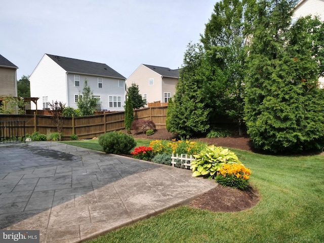 15152 Santander Dr, Gainesville, VA 20155 - view of yard featuring a patio area and a residential view