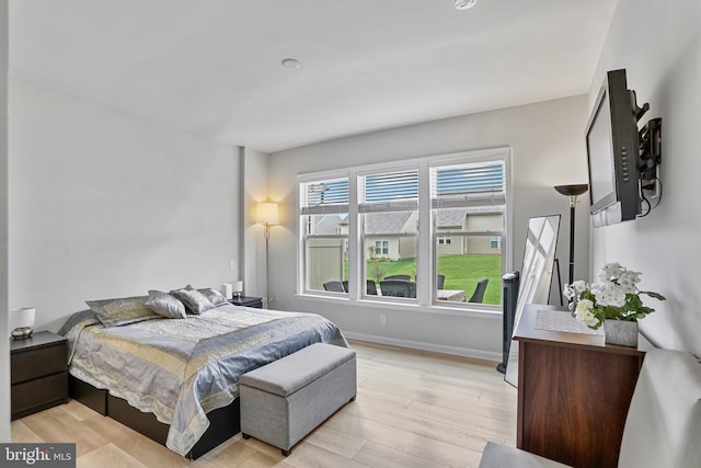 15937 Cucumber Magnolia Way, Haymarket, VA 20169 - bedroom with light wood-type flooring and baseboards