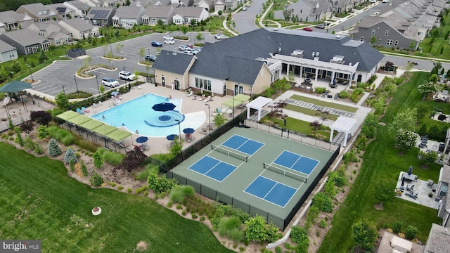 15937 Cucumber Magnolia Way, Haymarket, VA 20169 - aerial view of property's location featuring a pool and nearby suburban area