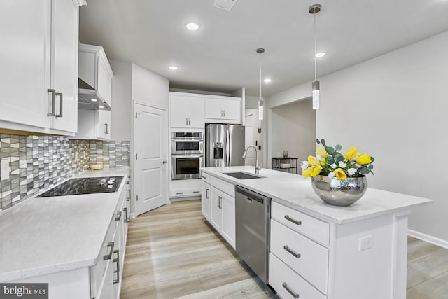 15937 Cucumber Magnolia Way, Haymarket, VA 20169 - kitchen with stainless steel appliances, white cabinets, an island with sink, backsplash, and recessed lighting