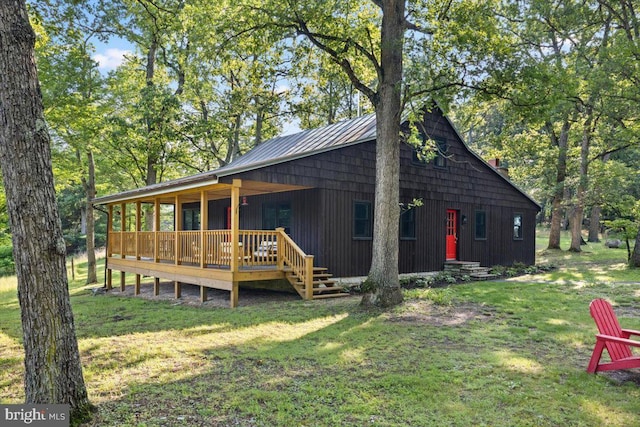 200 Sweetbriar, Winchester, VA 22603 - view of side of property with a lawn, a deck, and a metal roof