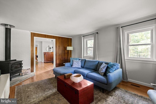 200 Sweetbriar, Winchester, VA 22603 - living area with wood finished floors and a wood stove