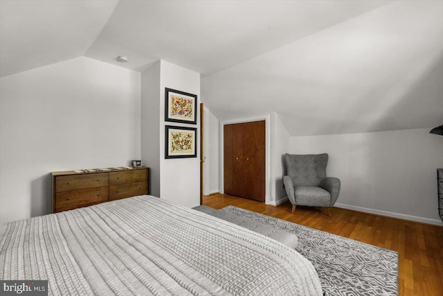 200 Sweetbriar, Winchester, VA 22603 - bedroom featuring vaulted ceiling and wood finished floors