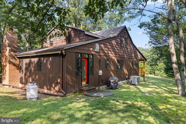200 Sweetbriar, Winchester, VA 22603 - view of property exterior featuring a lawn and a chimney