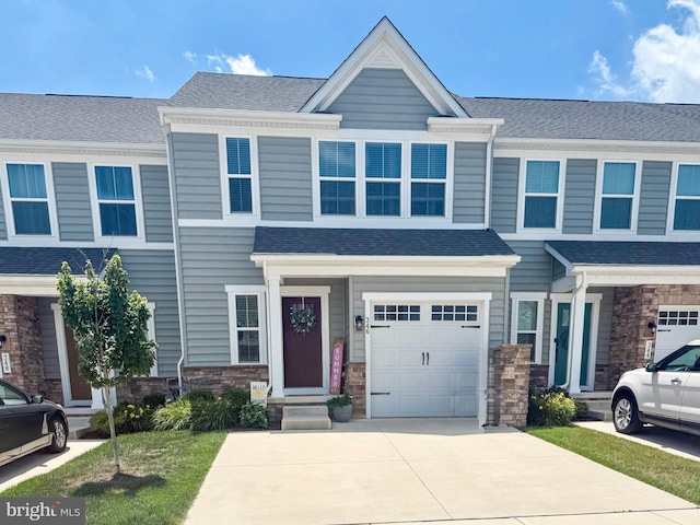 346 Goodwick Dr, Middletown, DE 19709 - view of property featuring stone siding, concrete driveway, an attached garage, and entry steps