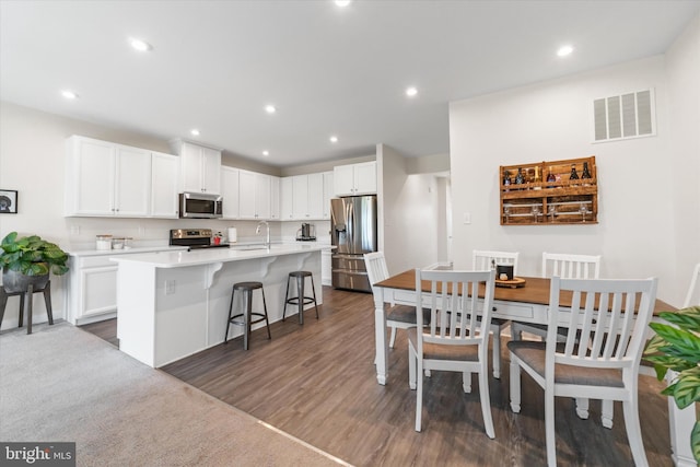 346 Goodwick Dr, Middletown, DE 19709 - dining space featuring dark wood-type flooring and recessed lighting
