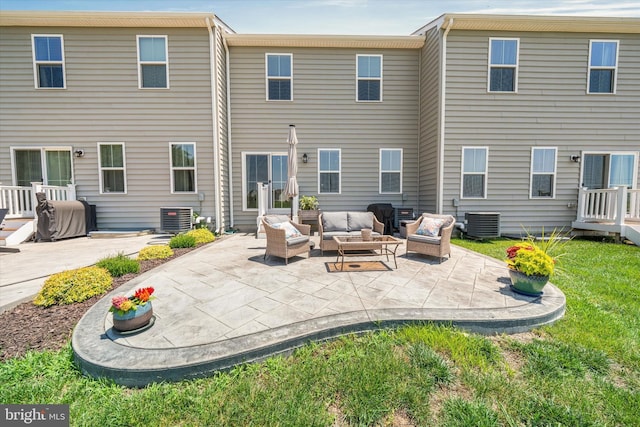 346 Goodwick Dr, Middletown, DE 19709 - rear view of house featuring an outdoor hangout area, a patio, and a lawn