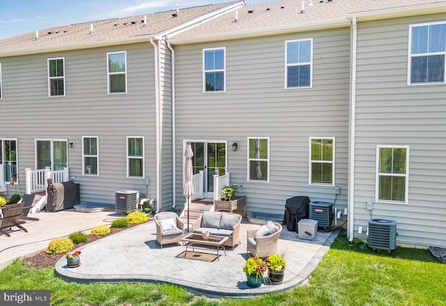 346 Goodwick Dr, Middletown, DE 19709 - rear view of house featuring an outdoor living space, a patio, and a yard