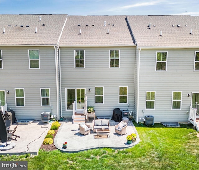 346 Goodwick Dr, Middletown, DE 19709 - rear view of house featuring outdoor lounge area, a patio, a lawn, and a shingled roof