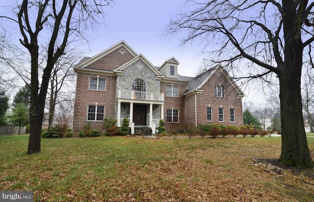 8813 Oak Leaf Dr, Alexandria, VA 22309 - georgian-style home with brick siding and a balcony