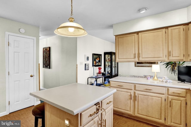 1319 Shady Ln, Tamaqua, PA 18252 - kitchen featuring light brown cabinetry, light countertops, a breakfast bar, pendant lighting, and a center island