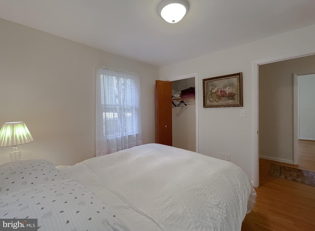 12987 Holly Way, Lusby, MD 20657 - bedroom with wood finished floors and a closet