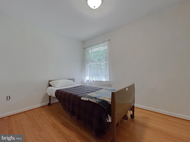 12987 Holly Way, Lusby, MD 20657 - bedroom with wood finished floors and baseboards