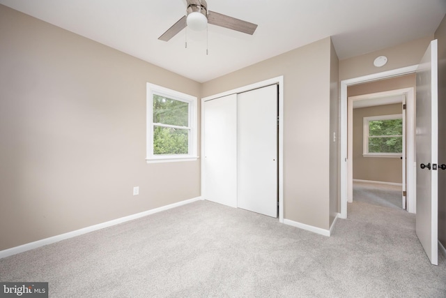 7043 Cromwell Ave, Salisbury, MD 21804 - unfurnished bedroom featuring multiple windows, light colored carpet, and a closet