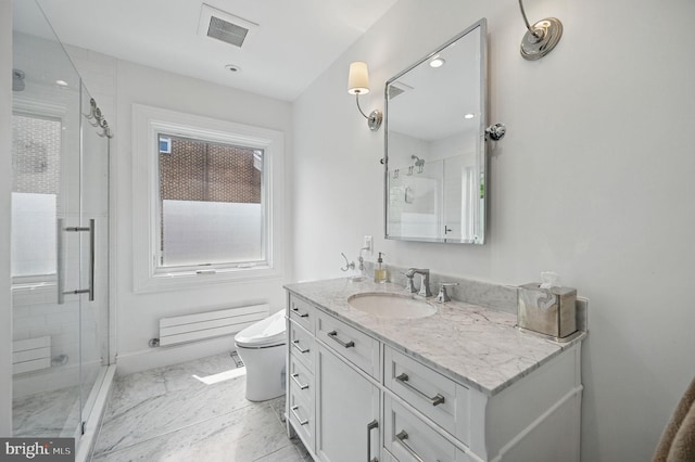 1646 Foxhall Rd NW, Washington, DC 20007 - bathroom featuring vanity, a stall shower, marble look tiles, and recessed lighting