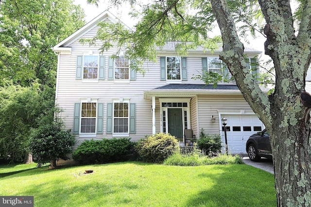 6509 Hazel Thicket Dr, Columbia, MD 21044 - view of front of home with a front yard, an attached garage, and driveway