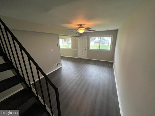 1730 Fountain Rock Way Unit 1730-C, Edgewood, MD 21040 - unfurnished living room with dark wood-style flooring, ceiling fan, and stairway