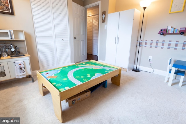 4328 Rolling Stone Way, Alexandria, VA 22306 - recreation room with carpet flooring and baseboards
