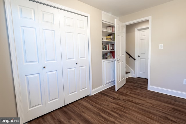 4328 Rolling Stone Way, Alexandria, VA 22306 - unfurnished bedroom featuring dark wood-style flooring and a closet
