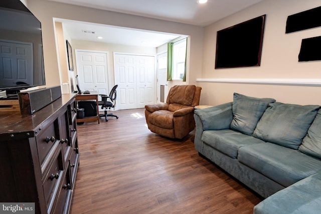 4328 Rolling Stone Way, Alexandria, VA 22306 - living room with dark wood finished floors, recessed lighting, and a desk