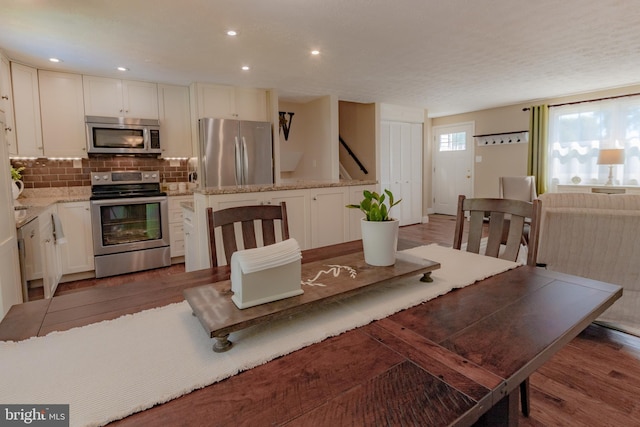 4328 Rolling Stone Way, Alexandria, VA 22306 - dining room featuring wood finished floors and recessed lighting
