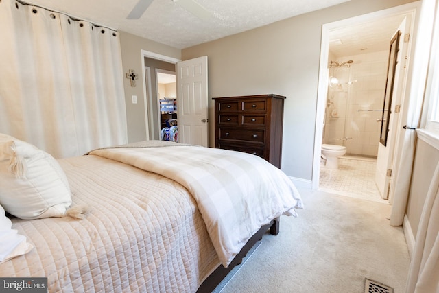 4328 Rolling Stone Way, Alexandria, VA 22306 - carpeted bedroom with ensuite bathroom and a ceiling fan