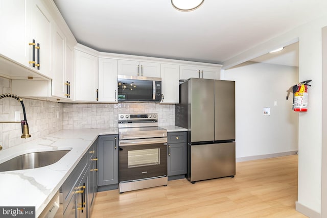43 Vernon Ct, Sicklerville, NJ 08081 - kitchen featuring stainless steel appliances, gray cabinets, tasteful backsplash, and white cabinets