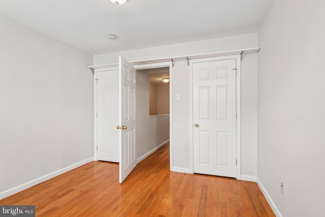 434 N Budd St, Philadelphia, PA 19104 - unfurnished bedroom featuring light wood-style floors and baseboards
