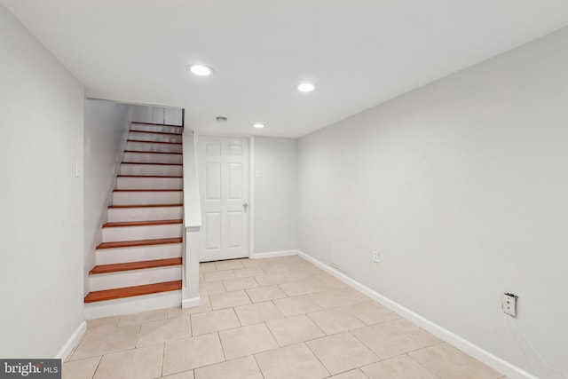434 N Budd St, Philadelphia, PA 19104 - stairs with recessed lighting and tile patterned floors
