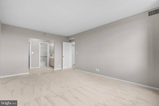 5501 Seminary Rd Unit 407S, Falls Church, VA 22041 - unfurnished bedroom with light carpet and ensuite bath