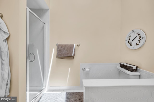 1632 Breakers Dr, Manahawkin, NJ 08050 - full bath with a shower stall, tile patterned floors, wainscoting, and tile walls