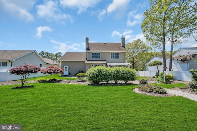 1632 Breakers Dr, Manahawkin, NJ 08050 - rear view of house with a chimney