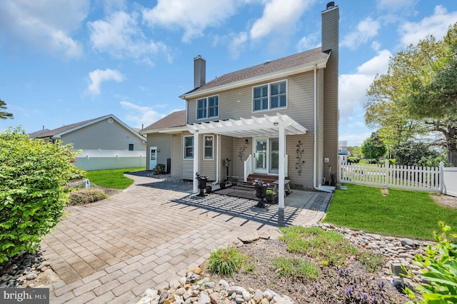 1632 Breakers Dr, Manahawkin, NJ 08050 - back of property with a pergola, a patio, a chimney, and a fenced backyard
