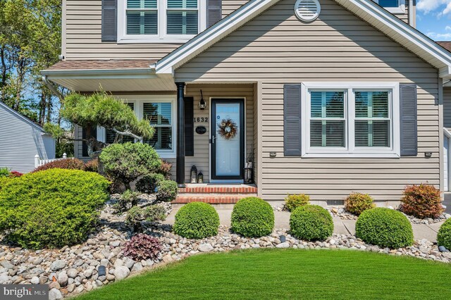1632 Breakers Dr, Manahawkin, NJ 08050 - view of front facade featuring a front lawn