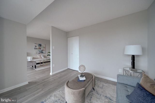 5300 Holmes Run Pkwy Unit 709, Alexandria, VA 22304 - living area featuring wood finished floors and baseboards