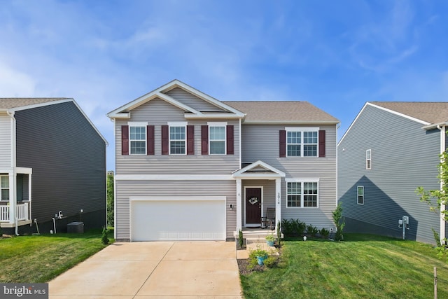 2014 Fauna Dr, Frederick, MD 21702 - traditional-style home with a garage, concrete driveway, and a front yard