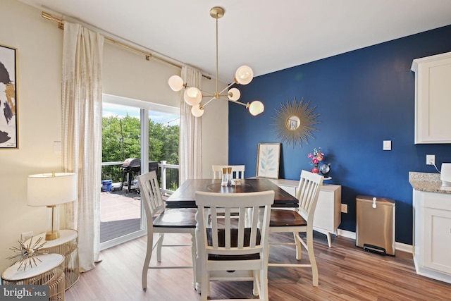 2014 Fauna Dr, Frederick, MD 21702 - dining space with light wood-style floors and a chandelier