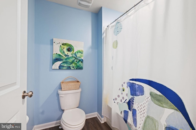 2014 Fauna Dr, Frederick, MD 21702 - full bath with a shower with shower curtain and wood finished floors
