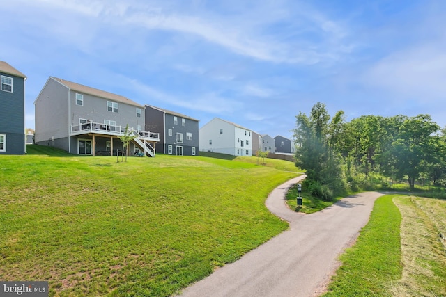 2014 Fauna Dr, Frederick, MD 21702 - view of home's community with a wooden deck, a residential view, a lawn, stairs, and driveway