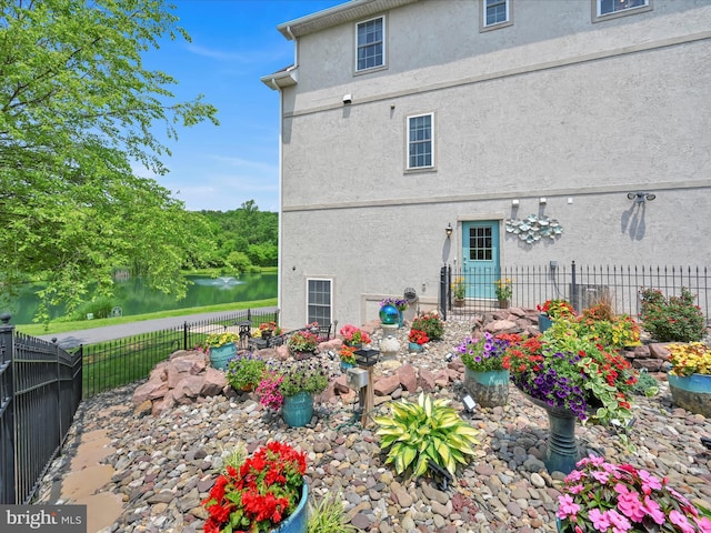 42 Bissenden Way, Reinholds, PA 17569 - rear view of property featuring stucco siding and a water view