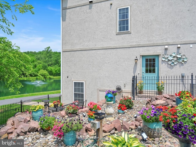 42 Bissenden Way, Reinholds, PA 17569 - back of house with stucco siding and a water view