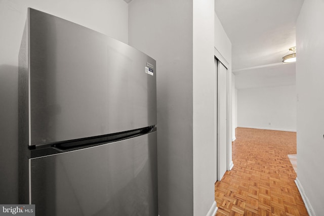 1301 N Harrison St Unit 1106, Wilmington, DE 19806 - kitchen view of freestanding refrigerator and baseboards