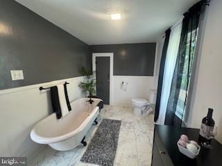 189 Rolling Stone Rd, Kylertown, PA 16847 - bathroom with a freestanding tub and marble finish flooring