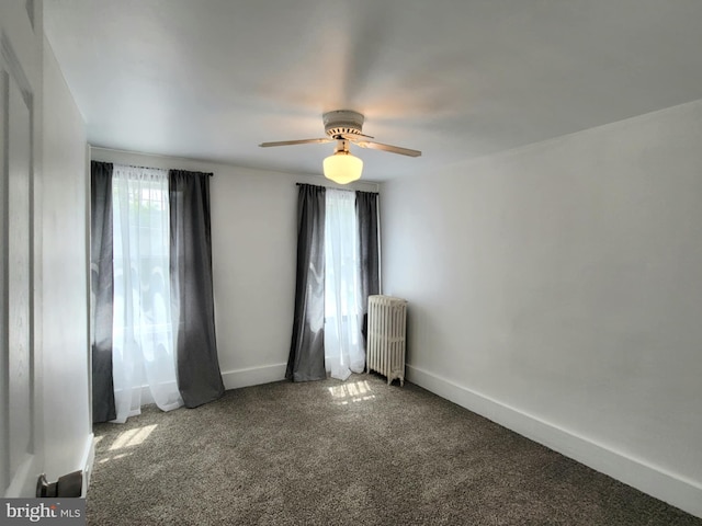 189 Rolling Stone Rd, Kylertown, PA 16847 - spare room with radiator, carpet floors, and a ceiling fan