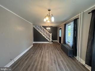 189 Rolling Stone Rd, Kylertown, PA 16847 - unfurnished living room with stairs, wood finished floors, and a chandelier